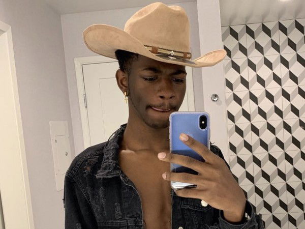 Link by nakedmalecelebs with the username @nakedmalecelebs,  August 30, 2019 at 9:14 PM and the text says 'Lil Nas X Nude Penis Pics & Leaked VIDEO!   #LilNasX #penis #cock #dick #leaked #jerkoff #bbc'