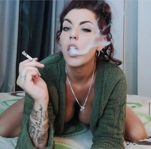 Link by LOVEMYWORLD3 with the username @LOVEMYWORLD3, who is a verified user,  February 19, 2024 at 2:51 AM. The post is about the topic Smoking women and the text says ''