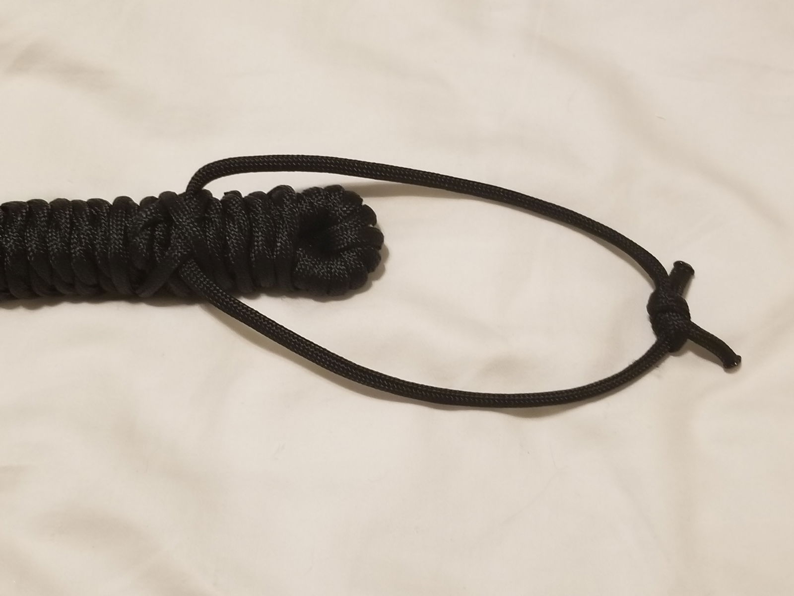 Photo by LemonadeStands with the username @LemonadeStands,  December 18, 2018 at 2:29 AM. The post is about the topic DIY and the text says 'Here's a paracord flogger I made as a Christmas gift for a friend!'