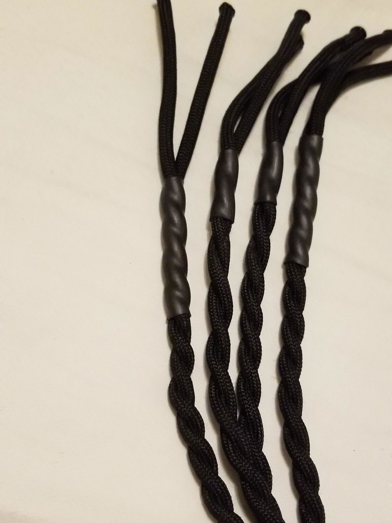 Photo by LemonadeStands with the username @LemonadeStands,  December 18, 2018 at 2:29 AM. The post is about the topic DIY and the text says 'Here's a paracord flogger I made as a Christmas gift for a friend!'