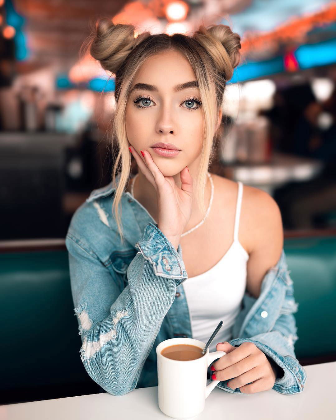 Photo by Devynsdogg with the username @Devynsdogg,  March 10, 2019 at 6:08 PM and the text says 'I could just gaze into those eyes while the coffee gets cold. #blondesarebeautiful #sexyfemales
/?utm_source=ig_web_copy_link'
