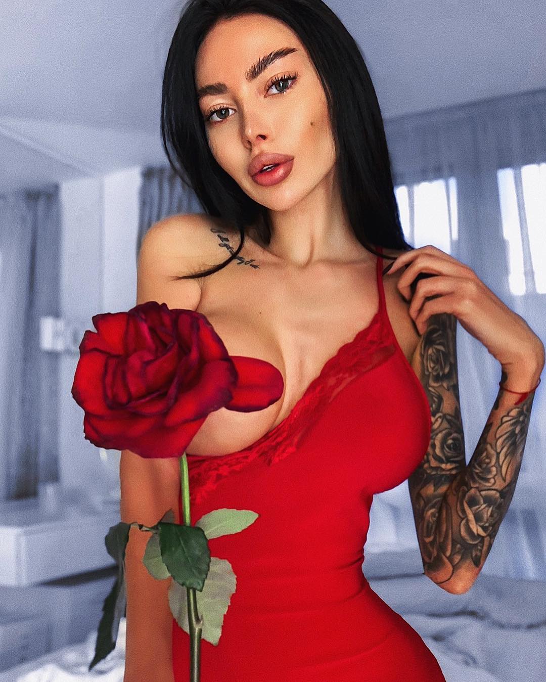 Photo by Devynsdogg with the username @Devynsdogg,  February 4, 2019 at 5:20 AM and the text says 'Alena is a red red rose. #russianmodels #faketits
/?utm_source=ig_web_copy_link'