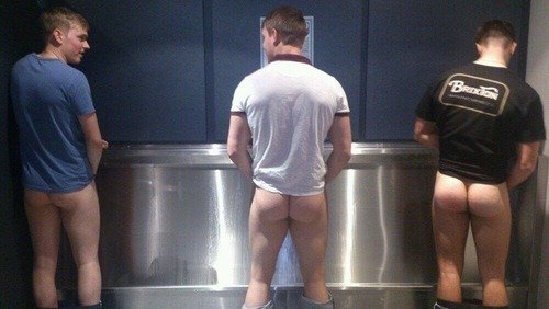 Shared Photo by JizzDripper with the username @JizzDripper,  June 15, 2019 at 11:42 AM and the text says 'Nice ass cheeks. I sometimes piss at the urinal at the gay bar with my pants below my ass, just for a tease and an invitation'