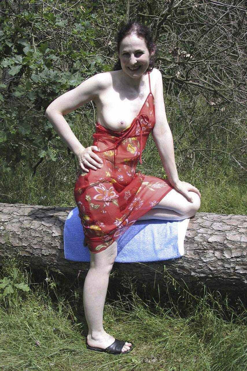 Photo by bommelsharesome with the username @bommelsharesome,  June 22, 2019 at 4:13 AM and the text says '5_Red_Flowery_Dress_Outdoors_012.jpg'