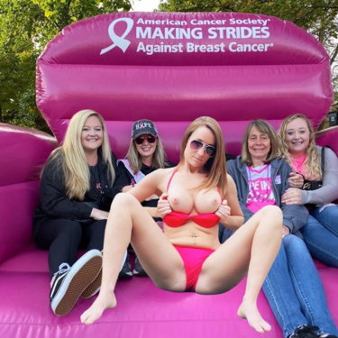 Breast Cancer Awareness -Women showing support and rais…