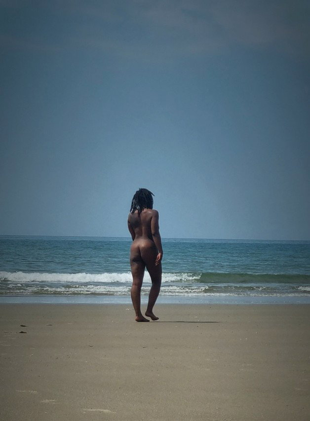 Photo by Mischiefandmayhem with the username @Mischiefandmayhem, who is a verified user,  June 16, 2023 at 5:42 PM. The post is about the topic Nude Beach and Outdoors and the text says '🔥🔥🔥on the beach!!!
thinking of creating  an onlyfans profile for more explicit content. should I??
#nakedbeach #ass #publicnaked #ebony #ebonywife #hotwife #vacationwife'