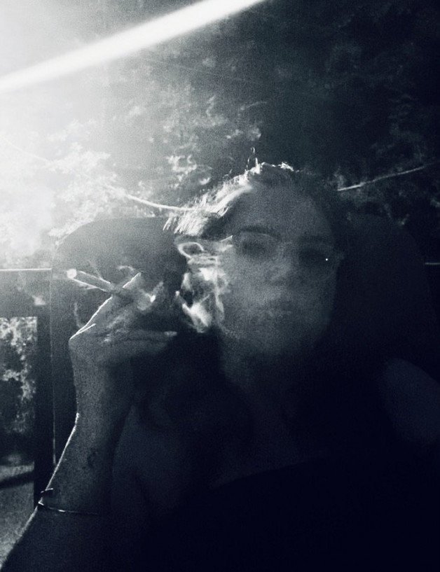 Photo by SwitchForHer with the username @SwitchForHer,  August 28, 2023 at 3:47 PM. The post is about the topic Smoking women and the text says '#boundlessswitch, #smoking, #blackandwhite, #smokingwomen'