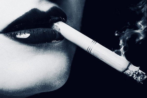 Photo by SwitchForHer with the username @SwitchForHer,  June 4, 2023 at 4:56 PM. The post is about the topic Black and White Erotica and the text says '#smoking, #smokingerotica, #lips, #lipstick, #blackandwhite, #noir'