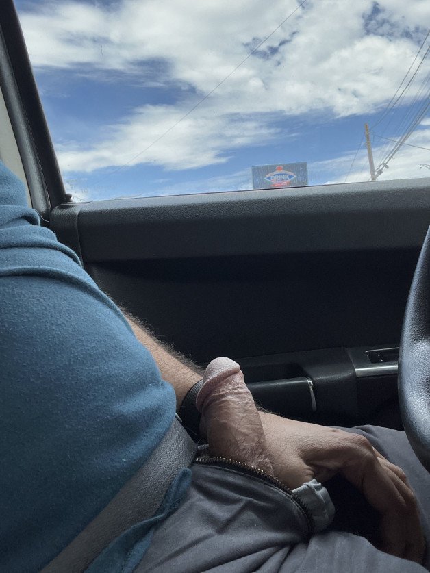 Photo by Zxcvbnmqa with the username @Zxcvbnmqa,  July 15, 2023 at 5:44 PM. The post is about the topic DIcks out and the text says 'feeling horny at a traffic light'
