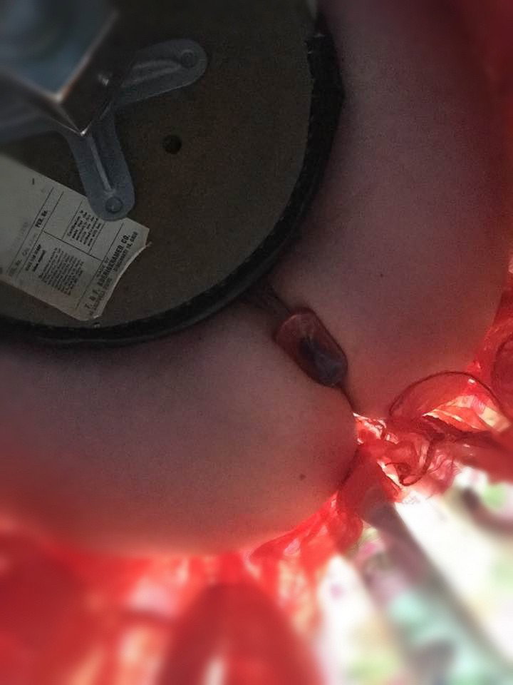 Photo by analcandy with the username @analcandy, who is a verified user,  May 5, 2019 at 2:28 AM. The post is about the topic Buttplugs and the text says 'Wearing my plug at work 😈 #buttplug #analplug #assstretching #analtraining'