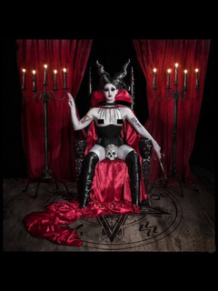 Photo by Schadenfreude with the username @Schadenfreude,  January 14, 2017 at 5:19 AM and the text says '#hail  #Satan  #Witch  #female  #throne  #scene  #corset  #boots  #leather  #horns  #skull'