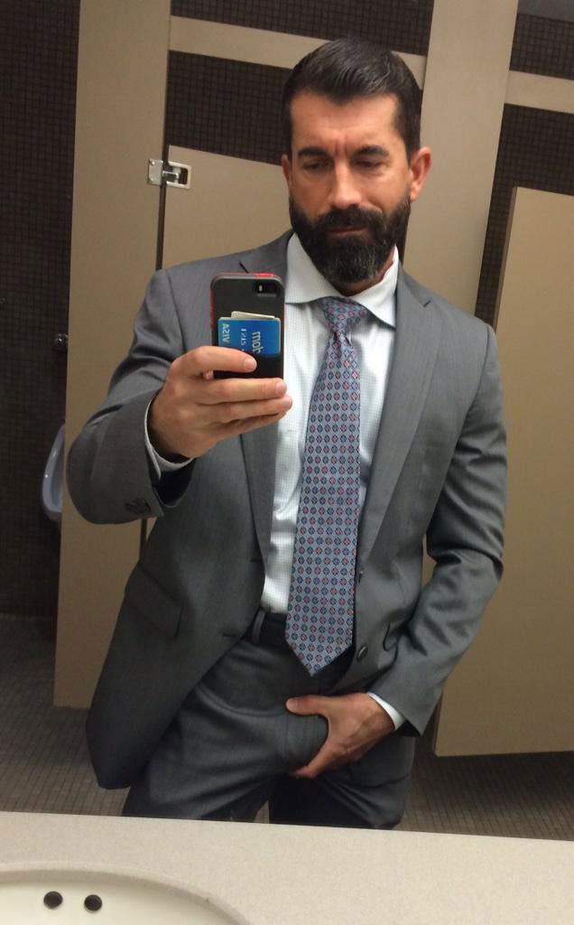 Photo by Schadenfreude with the username @Schadenfreude,  May 13, 2015 at 2:37 PM and the text says '#dick  #pic  #selfie  #Abe  #man  #in  #suit  #Male'