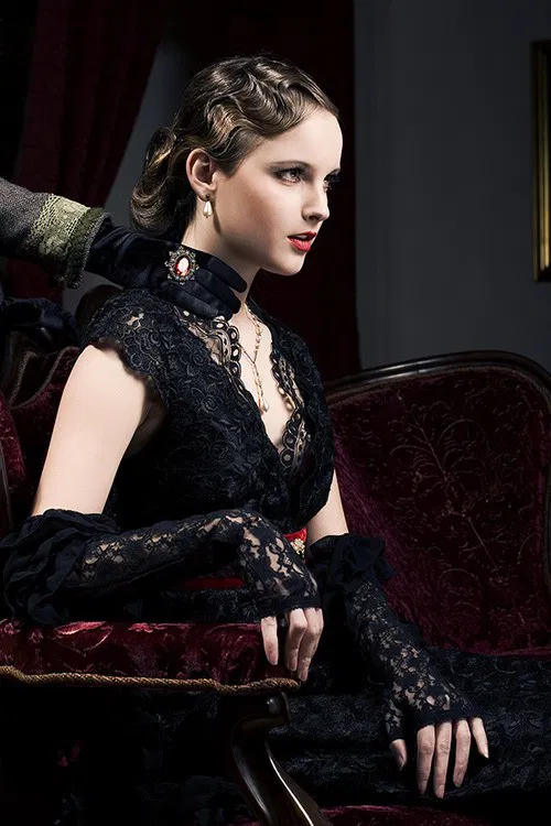 Photo by Schadenfreude with the username @Schadenfreude,  November 29, 2016 at 9:11 PM and the text says 'victorian-goth:Victorian Goth #female  #1920s  #vampire  #victorian  #lace  #elegant  #dress  #seated  #armchair  #chaise'