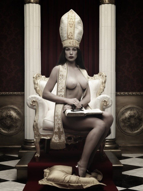 Photo by Schadenfreude with the username @Schadenfreude,  July 24, 2018 at 9:43 PM and the text says '#heresy  #religious  #themes  #pinup  #female  #pope  #lady  #pope  #bible  #seated  #throne'