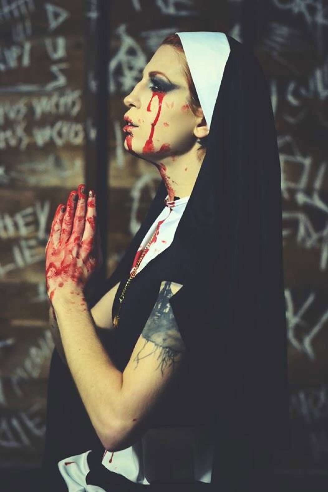 Photo by Schadenfreude with the username @Schadenfreude,  November 23, 2015 at 1:50 AM and the text says 'hjsteele:

Model @hjsteele
Photography by AP Skyline #nun  #blood  #macabre  #nsfw  #multi  #pic  #prayer'