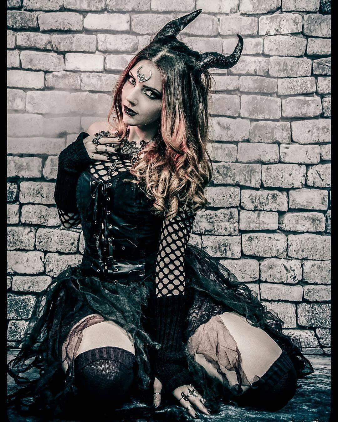 Watch the Photo by Schadenfreude with the username @Schadenfreude, posted on July 24, 2018 and the text says '#female  #demon  #succubus  #seated  #thigh  #highs  #corset  #goth  #dark  #horns'