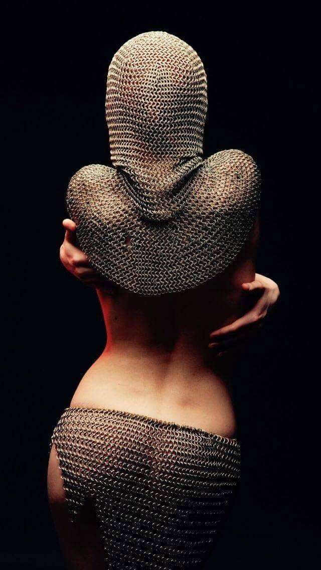 Photo by Schadenfreude with the username @Schadenfreude,  February 22, 2016 at 12:12 AM and the text says '#female  #chain  #mail  #spine  #curve  #lighting'