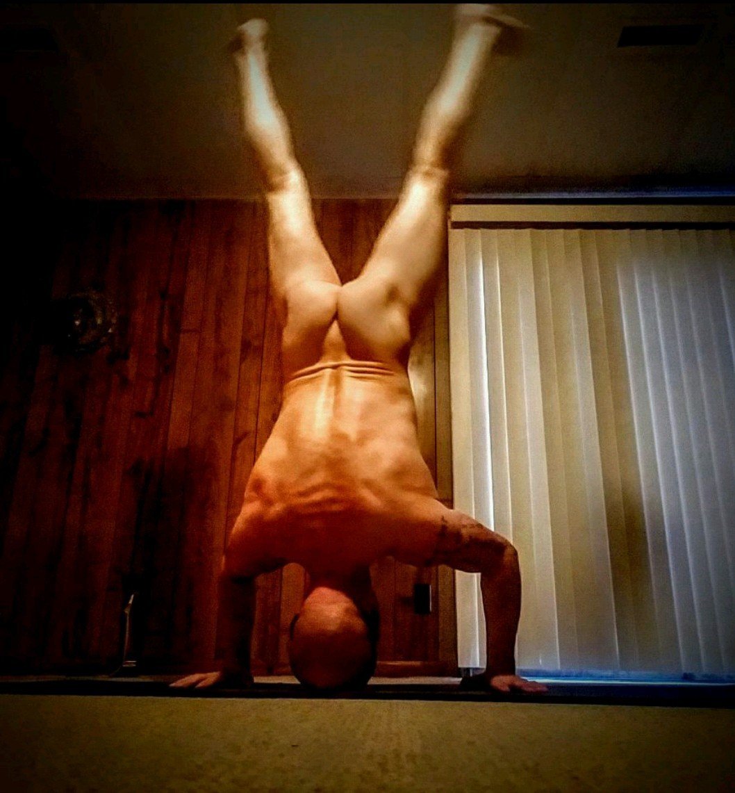 Photo by ArtOfNakedYoga with the username @ArtOfNakedYoga, who is a verified user,  December 11, 2018 at 5:14 AM. The post is about the topic Yoga in the nude and the text says '#yoga #me #nudeyoga #nakedyoga #handstand'