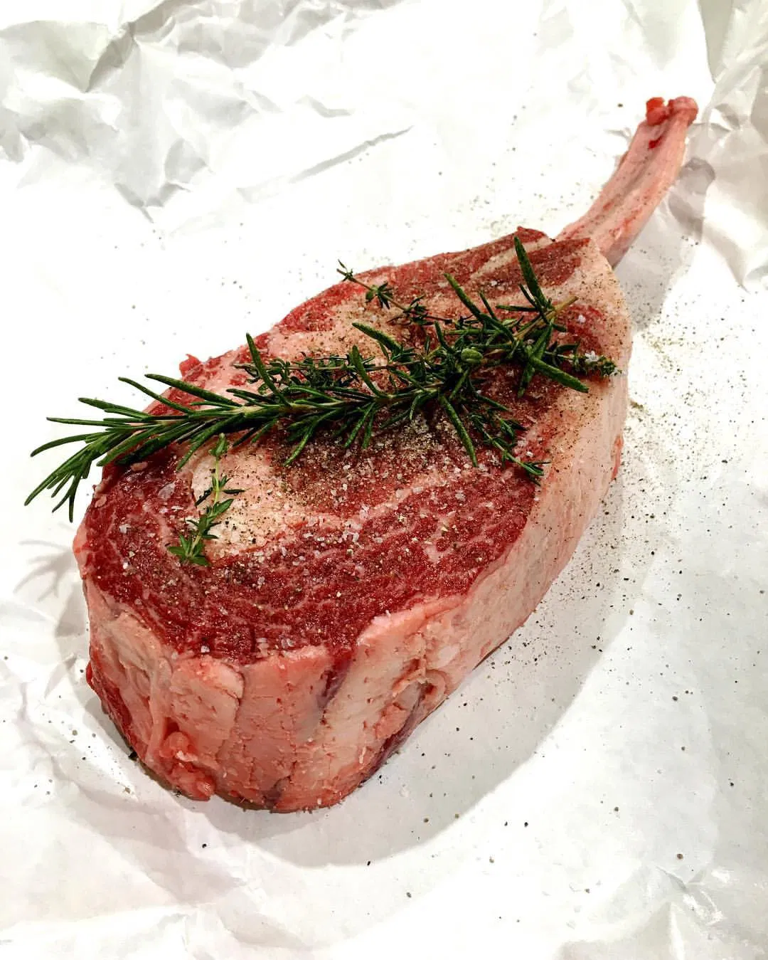 Photo by Unspoken with the username @darknunspoken,  June 19, 2016 at 12:19 AM and the text says 'bonerep:

Meat. On. A. Stick. 2.5 lbs bone-in prime ribeye. S&amp;P, rosemary and thyme. Ready to be bagged and soaked for tonight’s dinner. #beef #ribeye #foodie #foodiestuff #foodporn #homemade #homecook #sousvide #sousvidecooking #eatnomiku #eattender..'