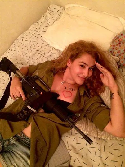 Photo by urodisco with the username @urodisco,  July 25, 2014 at 6:13 PM and the text says 'Standing with IDF.
It will be there as long as it needs to be there. #idf  #israel  #facebook  #group  #seminudes  #hot'