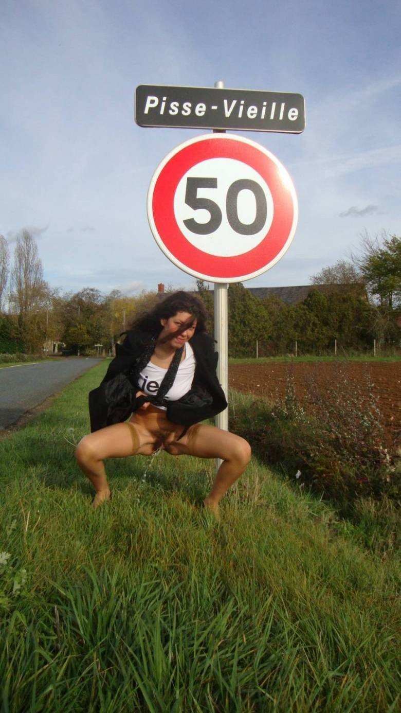 Photo by urodisco with the username @urodisco,  March 8, 2013 at 1:23 PM and the text says 'Breaking The Law #pee  #piss  #pissing  #fun  #pisse-vieille  #france  #road  #sign  #outdoors  #public'