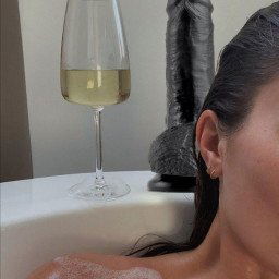 Shared Photo by Revealedlife69 with the username @Goto2hell,  July 27, 2021 at 2:02 AM. The post is about the topic MILF and the text says 'Wine, Bubble Bath, and a bid dildo - why I also often choose to stay in vs going out with friends'