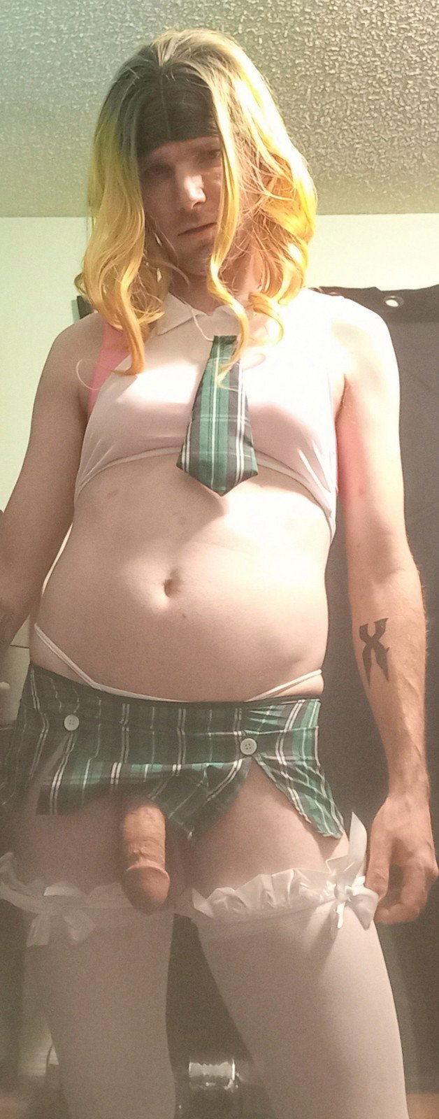 Photo by DeliciousDelilah with the username @DeliciousDelilah, who is a star user,  May 9, 2021 at 1:55 AM and the text says 'Slutty School Girl!
#schoolgirl #slut #crossdresser #crossdress #sexy #bigdick #miniskirt #blonde #calgary #crossdressing'