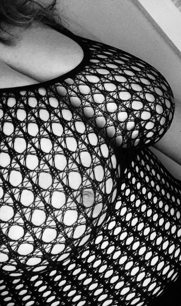 Photo by onlythetwoofus with the username @onlythetwoofus, who is a verified user,  June 2, 2022 at 12:23 AM. The post is about the topic Fishnet Clothing and the text says 'Peek a boo 💋

#bbw | #curvy | #sexybbw | #sexycurvy | #fishnet | #mesh | #nipple | #blackandwhite | #realcouple | #natural'