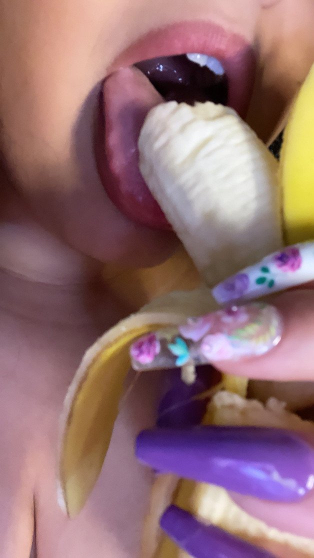 Album by LovelyLynette with the username @LovelyLynette, who is a verified user,  October 9, 2021 at 5:39 AM. The post is about the topic Slut Nails and the text says 'Do you like the way my lips wrap around this, Papi? 🥺🥰'