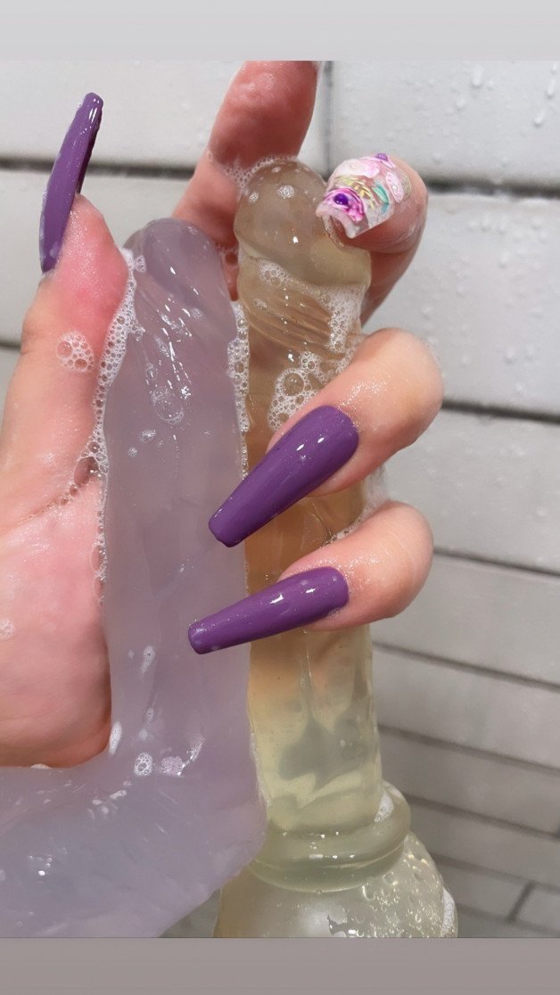 Photo by LovelyLynette with the username @LovelyLynette, who is a verified user,  October 10, 2021 at 7:21 AM. The post is about the topic Slut Nails and the text says 'Washing my lipstick off these cute little toys 🧼🧼'