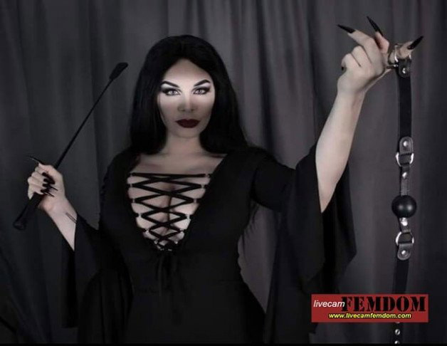 Photo by FETISHcams with the username @FETISHcams,  October 28, 2022 at 7:01 PM. The post is about the topic Domination, Fetish, Bdsm, Mistress and the text says 'I will feed on livecamfemdom upon your despair.

I shall make you despair now!

#BDSM #femdom #fetish #blackhairedGothicDomme #blackdress #blackballgag #blackridingcrop #longblackfingernails'
