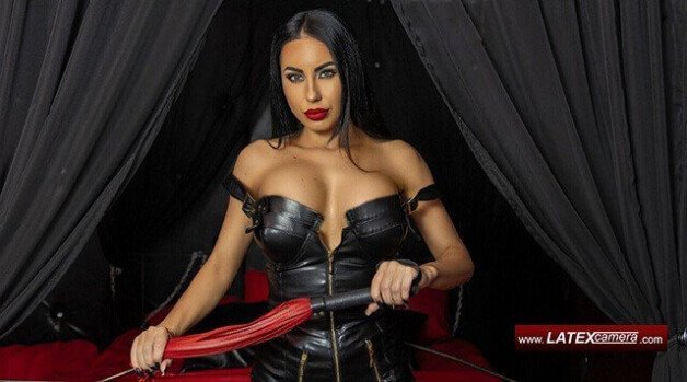 Photo by FETISHcams with the username @FETISHcams,  April 25, 2023 at 5:39 PM. The post is about the topic Domination, Fetish, Bdsm, Mistress and the text says 'I am a leather Mistress on latexcamera, one that you will never forget.

Meet Me in leather now!

#BDSM #femdom #fetish #brunetteMistress #blackleatherdress #redflogger'