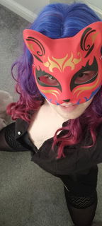 Album by Lexavier with the username @Lexavier, who is a verified user,  March 10, 2023 at 9:00 PM. The post is about the topic Crossdressers and the text says 'Here's a better focus on the mask and wig. This is where I was really starting to get into the role and could see myself going wild with a man in my room. This is more fem than I've ever felt I think. What do you think?'