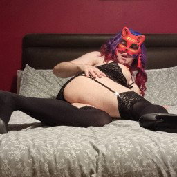 Photo by Lexavier with the username @Lexavier, who is a verified user,  March 14, 2024 at 9:00 PM. The post is about the topic Crossdressers and the text says 'Enjoyed this shot! I think you can tell. Imagine coming into the room and I'm there waiting for you like this... think we'd have some fun!'