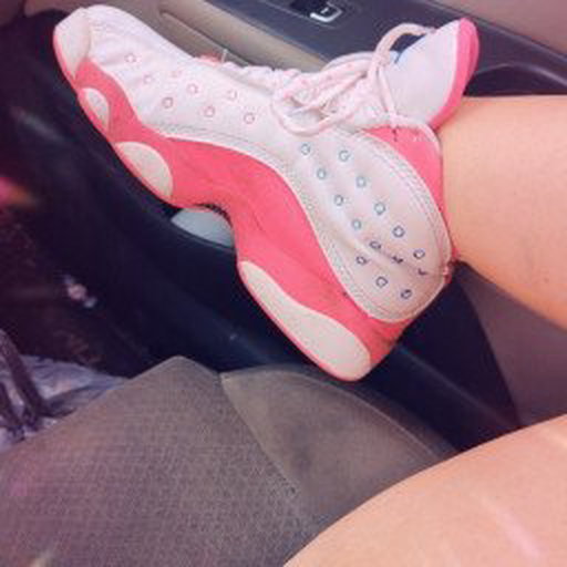 Photo by Hitgirly with the username @Hitgirly, who is a verified user,  August 10, 2022 at 11:38 PM and the text says 'I swear daddy spoils the shit out of me with all these new kicks!'