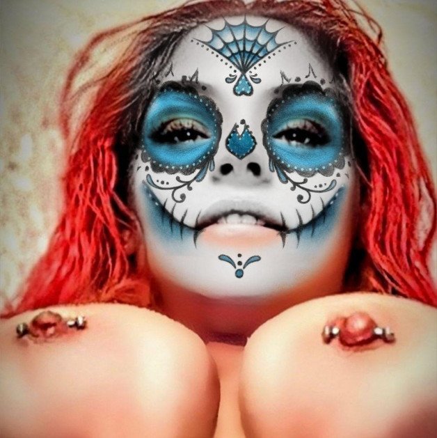 Photo by Hitgirly with the username @Hitgirly, who is a verified user,  October 30, 2022 at 5:44 PM. The post is about the topic Amateurs and the text says 'How bout a little "sugar" skull for your Halloween day 30?'