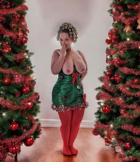 Album by Hitgirly with the username @Hitgirly, who is a verified user,  December 12, 2024 at 9:56 PM. The post is about the topic Nice Tits and the text says 'I need help hanging more tinsel'