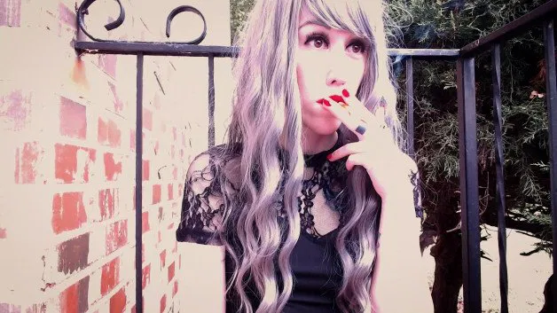 Album by Lita Rene with the username @litarene, who is a star user,  October 11, 2021 at 2:43 AM. The post is about the topic Smoking babes and Fucking and the text says 'Video stills from my newest video, "Red Lipstick And Cigarette Smoking". If you've got a classic smoking fetish, you'll love this one. See my profile for more!'