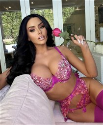 Shared Photo by flyerman with the username @flyerman,  May 19, 2024 at 7:46 PM and the text says 'Pink lingerie is my weakness 😍'