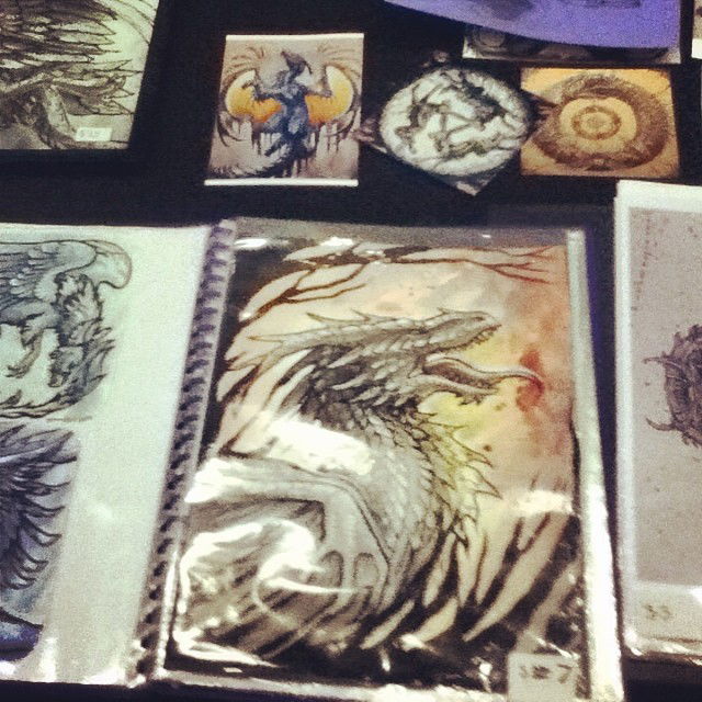 Photo by LilMissMorpho with the username @LilMissMorpho,  May 25, 2014 at 2:04 PM and the text says '#Dragons #Art #armageddonexpo #art  #armageddonexpo  #dragons'