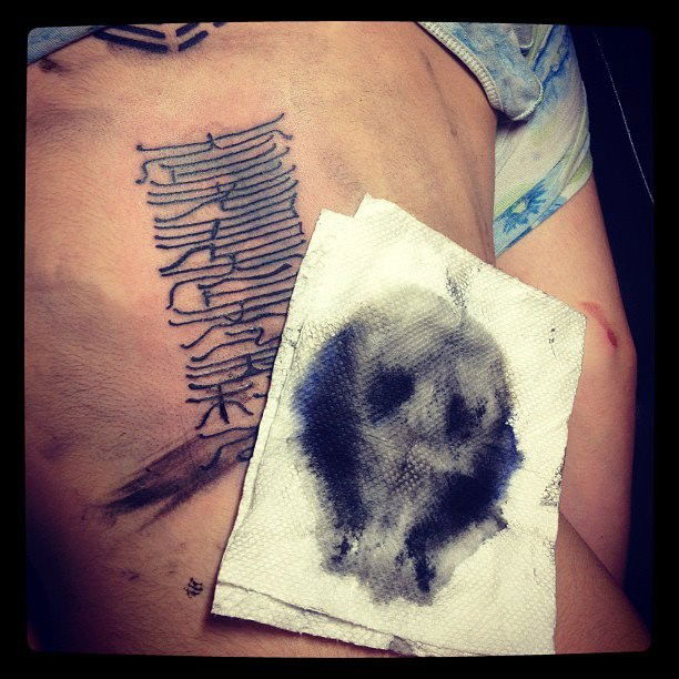 Photo by LilMissMorpho with the username @LilMissMorpho,  July 17, 2012 at 11:43 AM and the text says 'It&rsquo;s a tattoo to ward off evil spirits&hellip; this is what happened when the artist wiped off the excess ink. Creepy, right?  #creepy  #stuff  #paranormal  #events  #strange  #tattoos  #unusual  #paranormal  #awesome  #ink  #mysteries  #happenings'