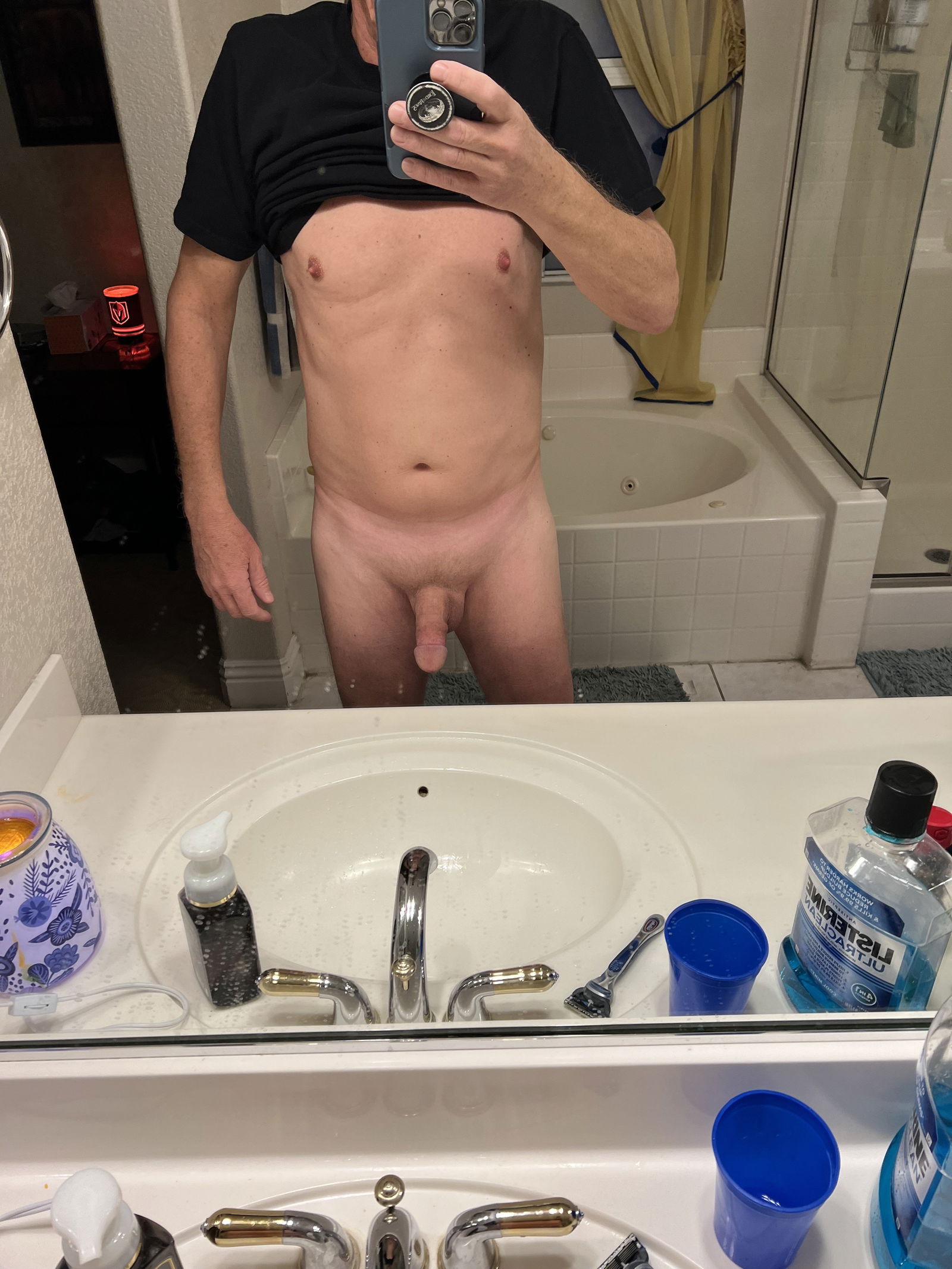 Album by Desertguy with the username @Desertguy, who is a verified user,  December 14, 2023 at 3:00 PM. The post is about the topic Gay men in T-shirts and the text says 'Black Tshirt day'