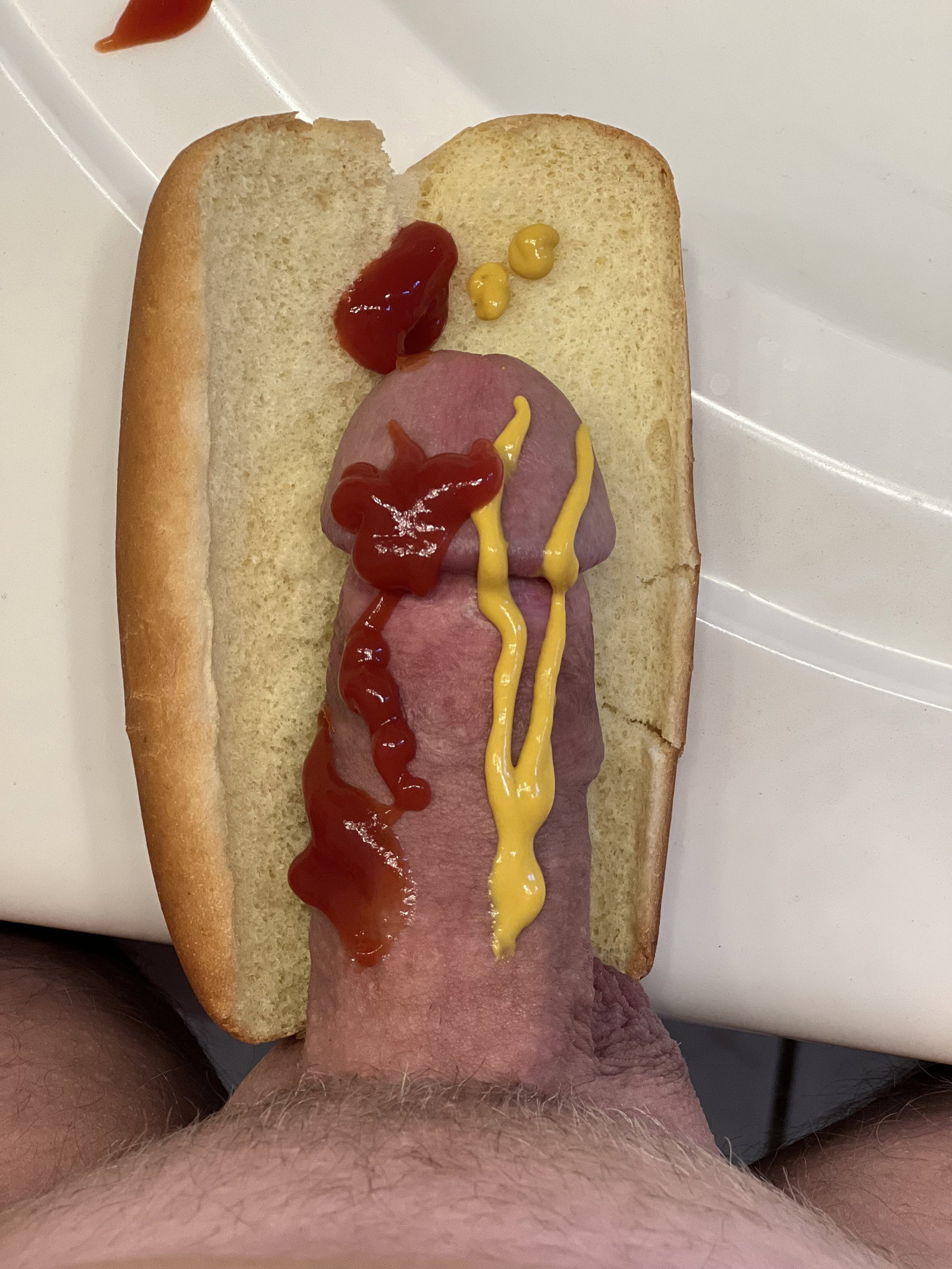 Photo by Desertguy with the username @Desertguy, who is a verified user,  July 12, 2023 at 2:30 PM. The post is about the topic MEN Over 50 and the text says 'I've always wanted to try this. Anyone for a hot dog in July?'