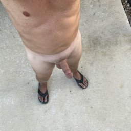 Photo by Desertguy with the username @Desertguy, who is a verified user,  July 25, 2023 at 1:55 PM and the text says 'Naked Flip Flops, Tan Lines, outdoors'