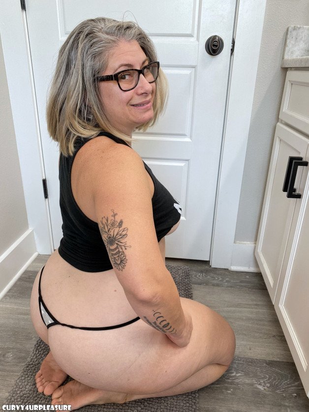 Photo by Curvy4urpleasure with the username @Curvy4urpleasure, who is a star user,  February 3, 2023 at 8:41 PM. The post is about the topic MILF and the text says 'Do I have dangerous curves? #MILF #Mom #Mommy #Sexy #Fyp #nerdy #curvy #thong #pawg #nsfwtw #nsfwtwt #fansly #booty #butt #bubblebutt #ass #tits #boobs #smile #eyecontact'