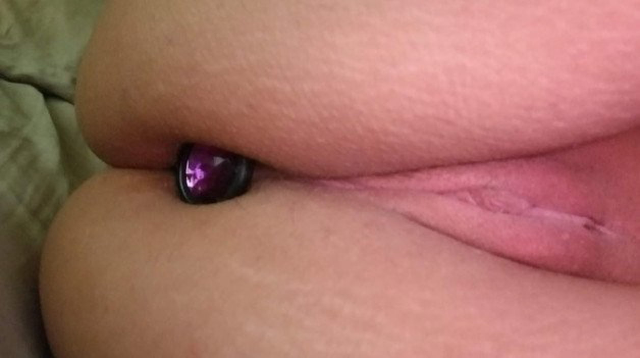 Photo by Hunggunguy7880 with the username @Hunggunguy7880,  September 28, 2023 at 11:30 PM. The post is about the topic Buttplugs and the text says 'What would you do to my sexy wife's tight pussy as she wears her purple plug?'