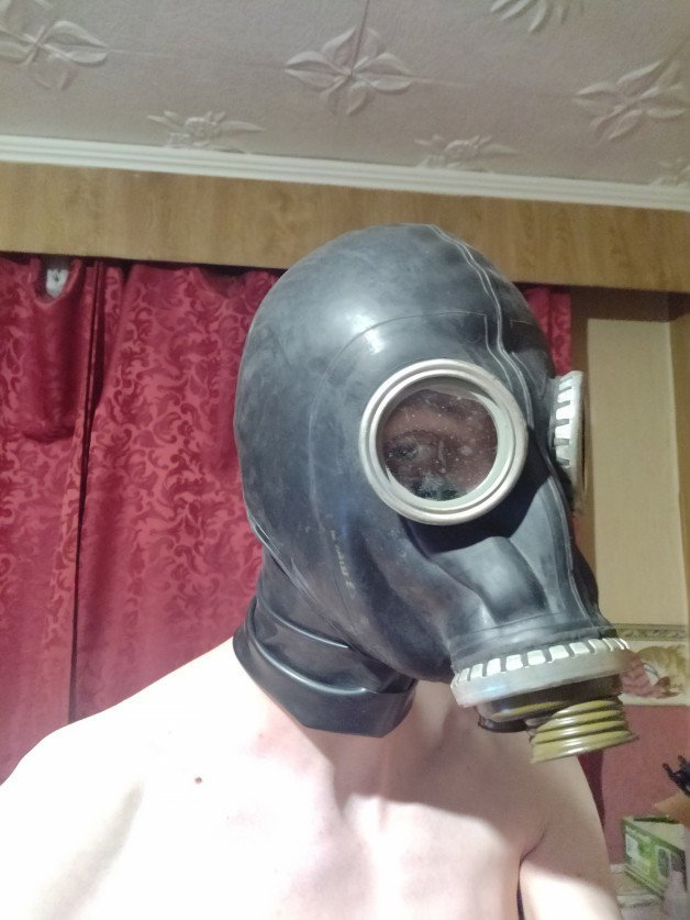 Photo by RubberAddict with the username @danielmoby,  November 21, 2021 at 6:07 AM and the text says 'Me wearing gas mask!'