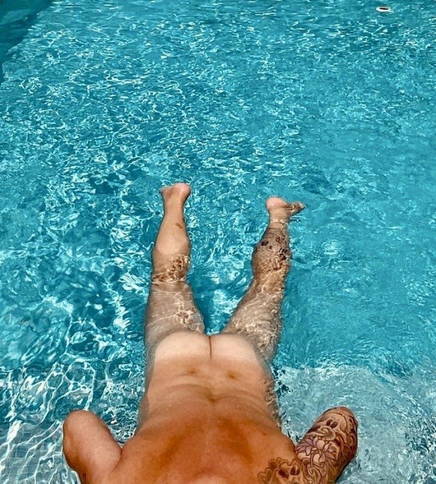 Photo by M75009 with the username @M75009, who is a verified user,  November 22, 2021 at 8:33 PM. The post is about the topic French Nudist - Nudistes Français and the text says 'naked in the pool'