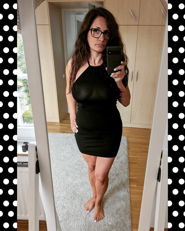 Photo by HotwifeHunny with the username @HotwifeHunny, who is a star user,  July 12, 2023 at 1:08 PM. The post is about the topic MILF and the text says 'Transcending Boundaries: Celebrating the Seductive Charms of Sheer Black! 😍🔥'