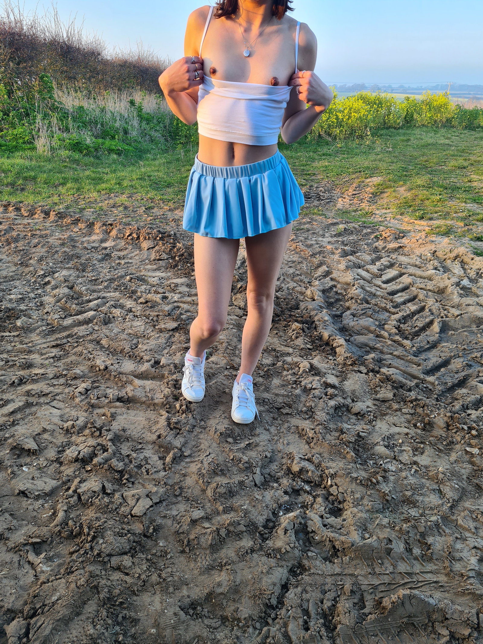 Photo by Kate with the username @bunnygirl26, who is a verified user,  April 2, 2022 at 4:34 PM. The post is about the topic Teen and the text says 'is my skirt a bit to short?? 💋💋'